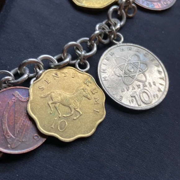 925 sterling silver coin charm bracelet 11 of them on here milor bracelet